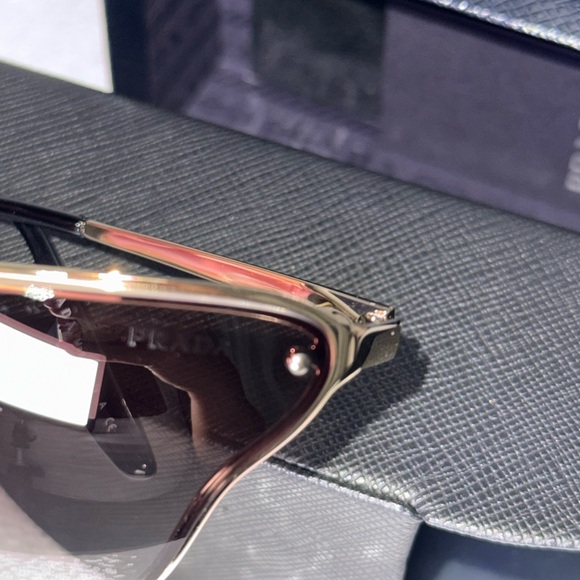 Prada Women\'s Gold and Black Sunglasses